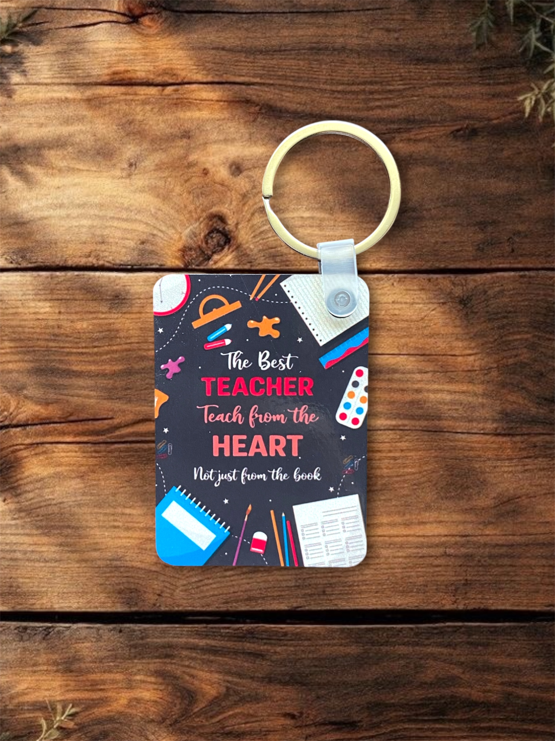 "Best Teacher Teaches From The Heart" Keychain